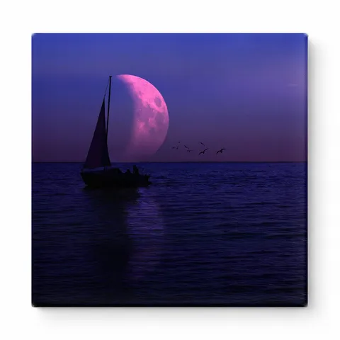 Moonlit Sailboat at Sea